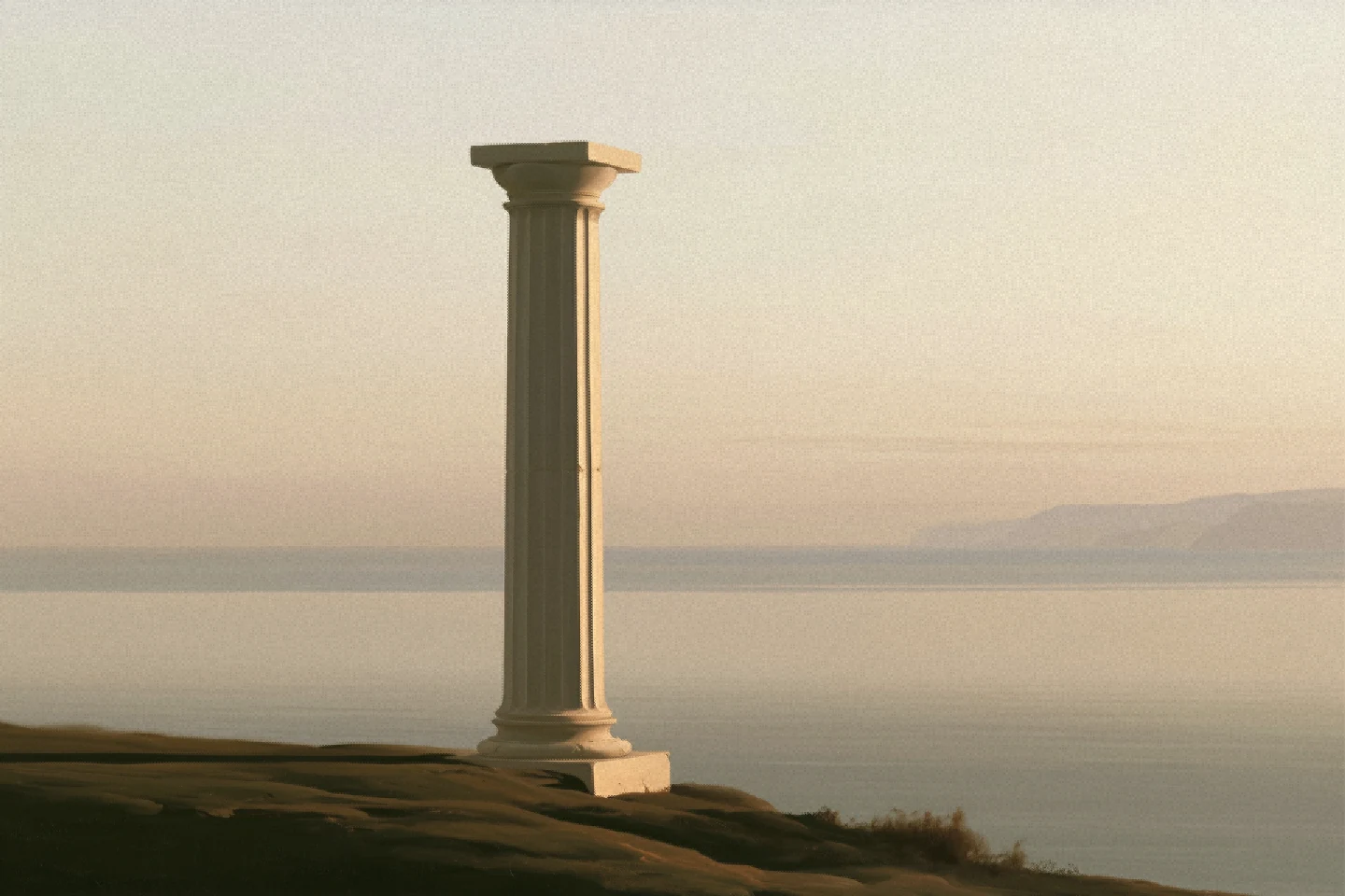 A single broken column alone on a headland